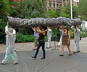 From the joint People's Puppets/ Guitarmy /RMO action Wednesday, picture copyright © Mickey Z-Vegan.