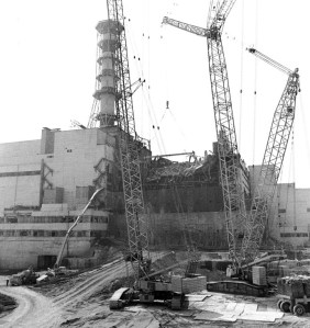 Building a concrete sarcophagus over the Chernobyl plant. Total deaths from radiation exposure estimated at 985,000 as of 2007.